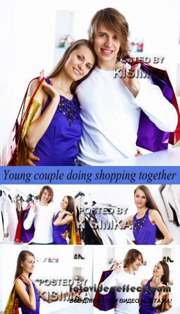 Stock Photo: Young couple doing shopping together